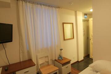 Фото номера Стандартный одноместный номер Отель Hotel Urkin Piilopirtti г. Pinsiö 3